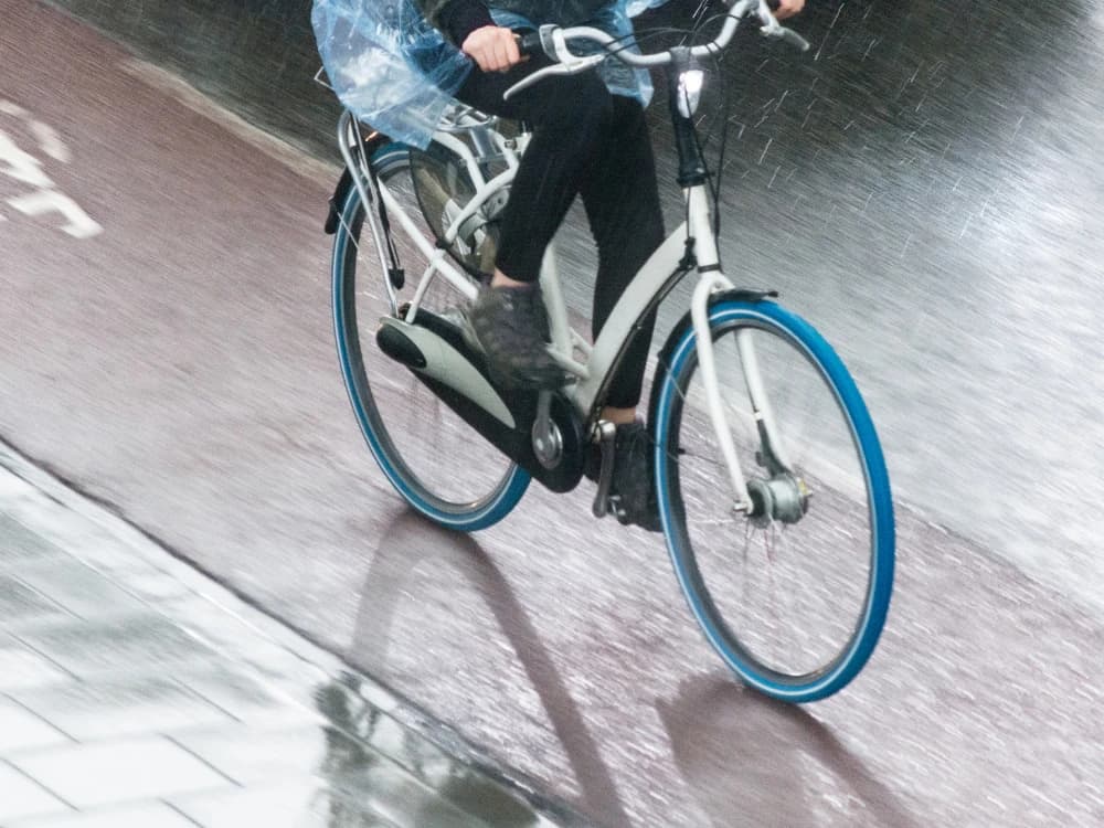 Cycling in the rain: 10 tips for safe travel on-bike-with-the-rain-tips-for-safe-travel image